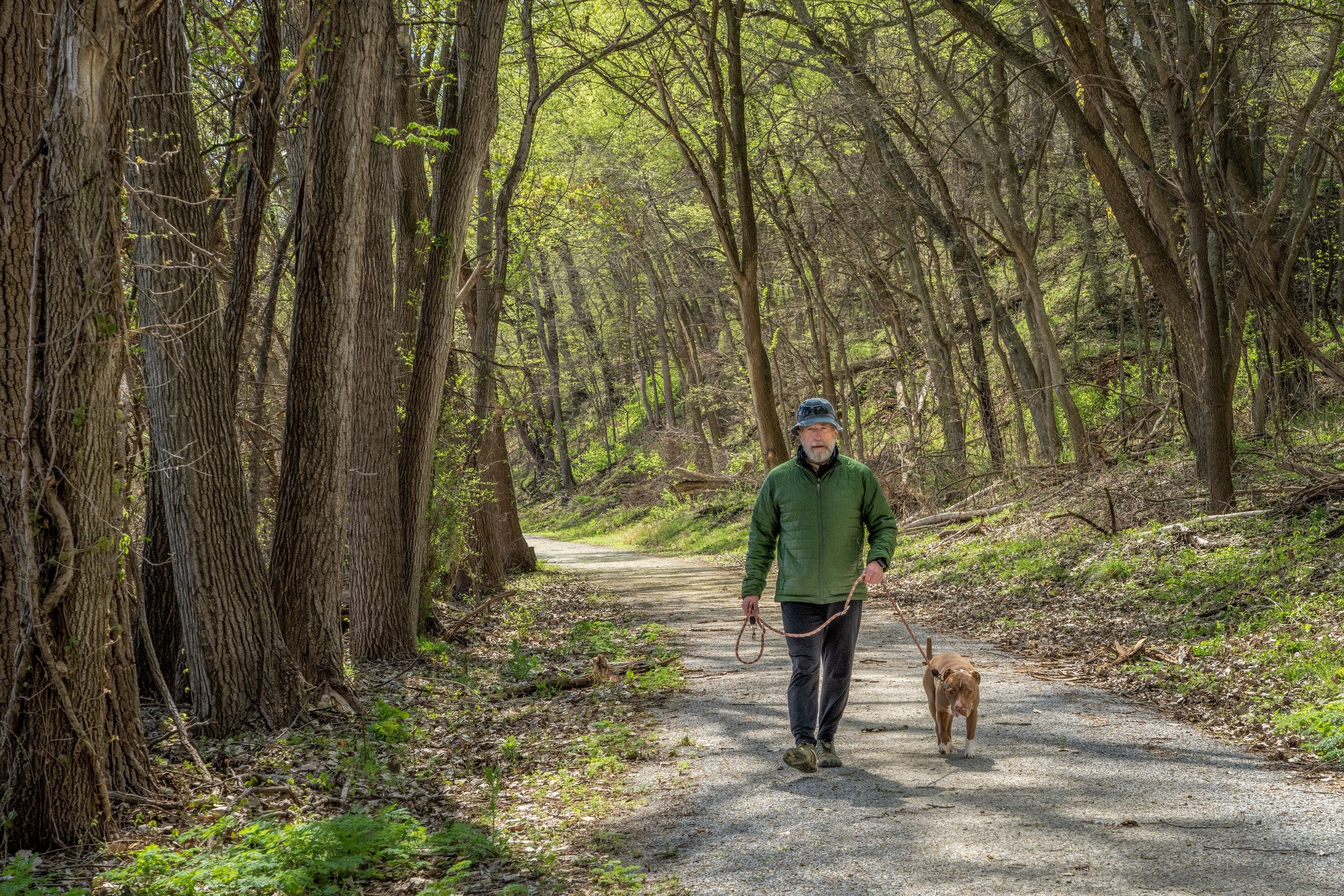 Man walking dog in Nebraska.