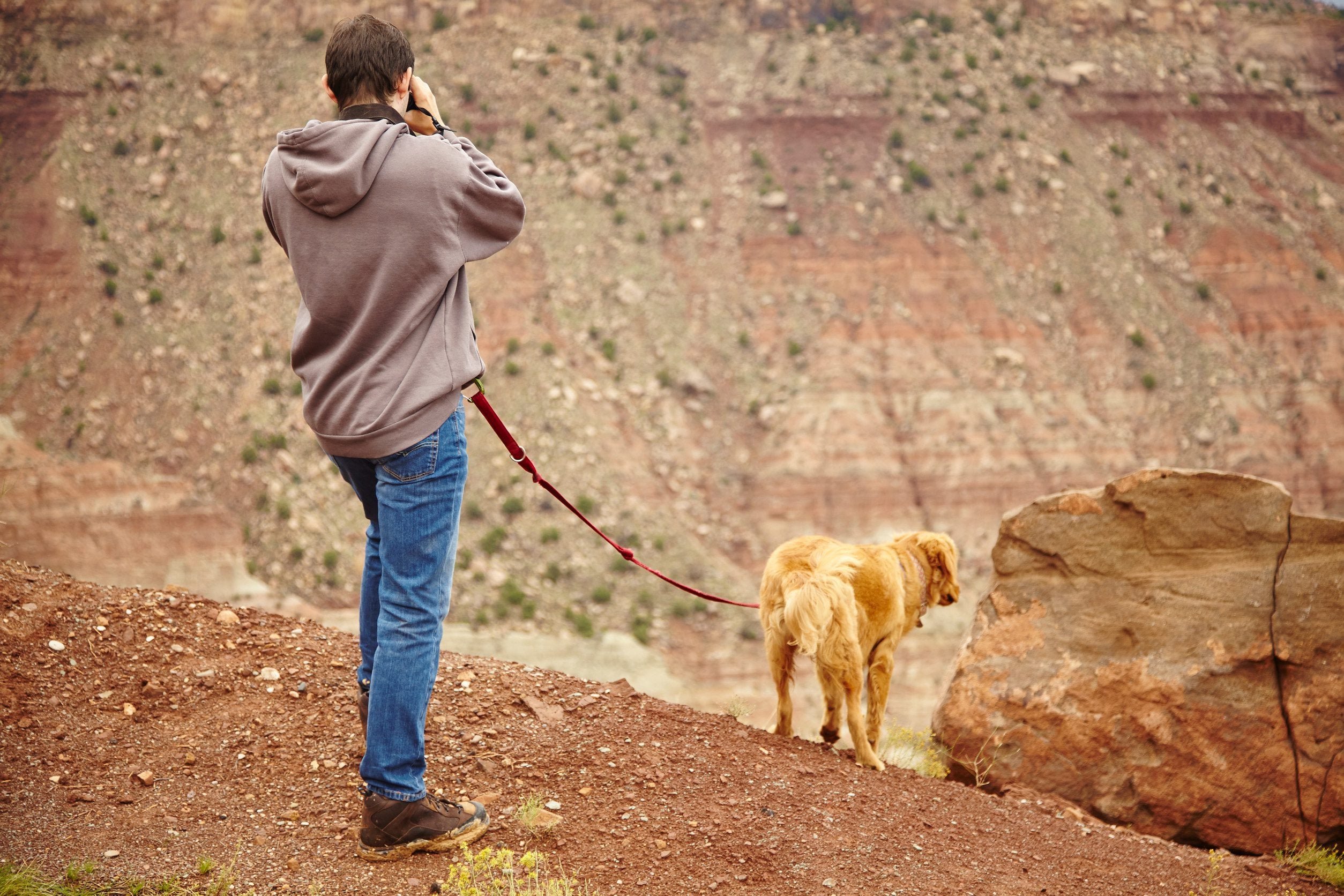 Man walking his dog in Phoenix, Arizona.