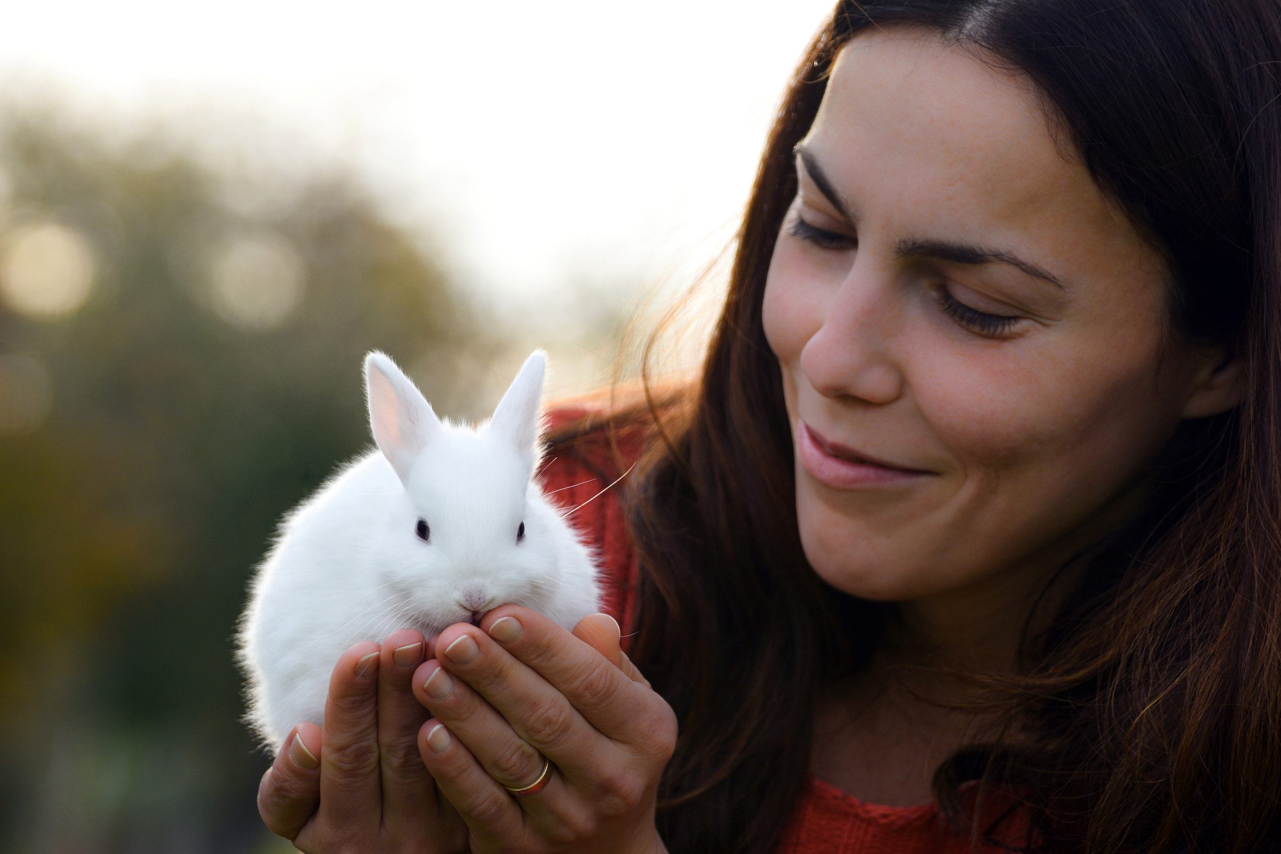 A woman holding a rabbit, a great choice for an ESA, in Chandler, AZ.