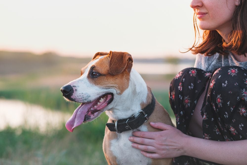 A woman spending quality time with her emotional support animal (ESA) in Mobile, AL.