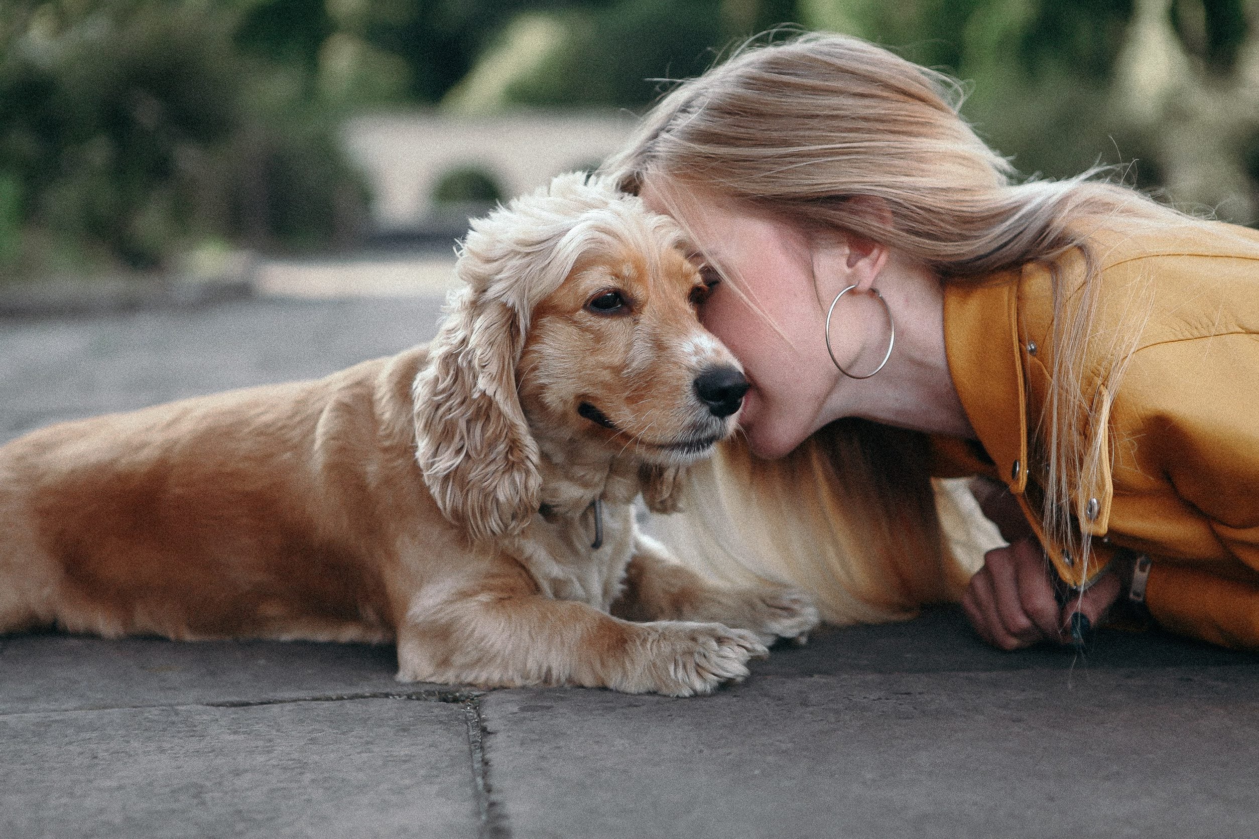 A woman kissing her emotional support animal in Orlando, FL.