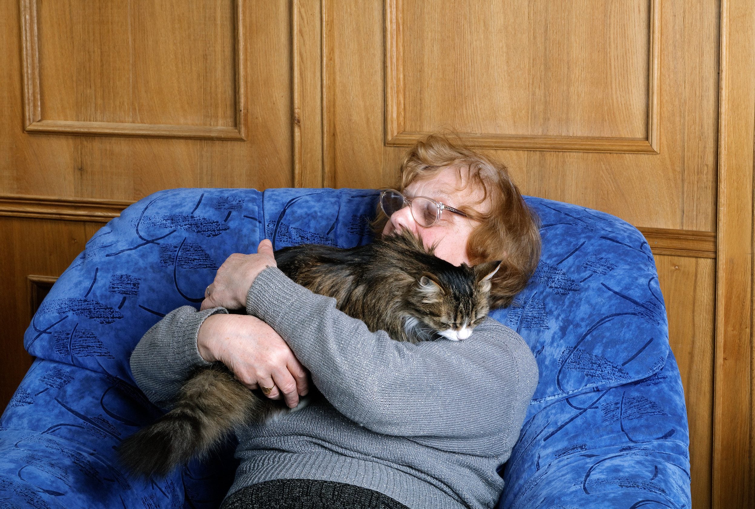 A St. Louis resident hugging their cat after finding out how to get an ESA letter in Missouri.
