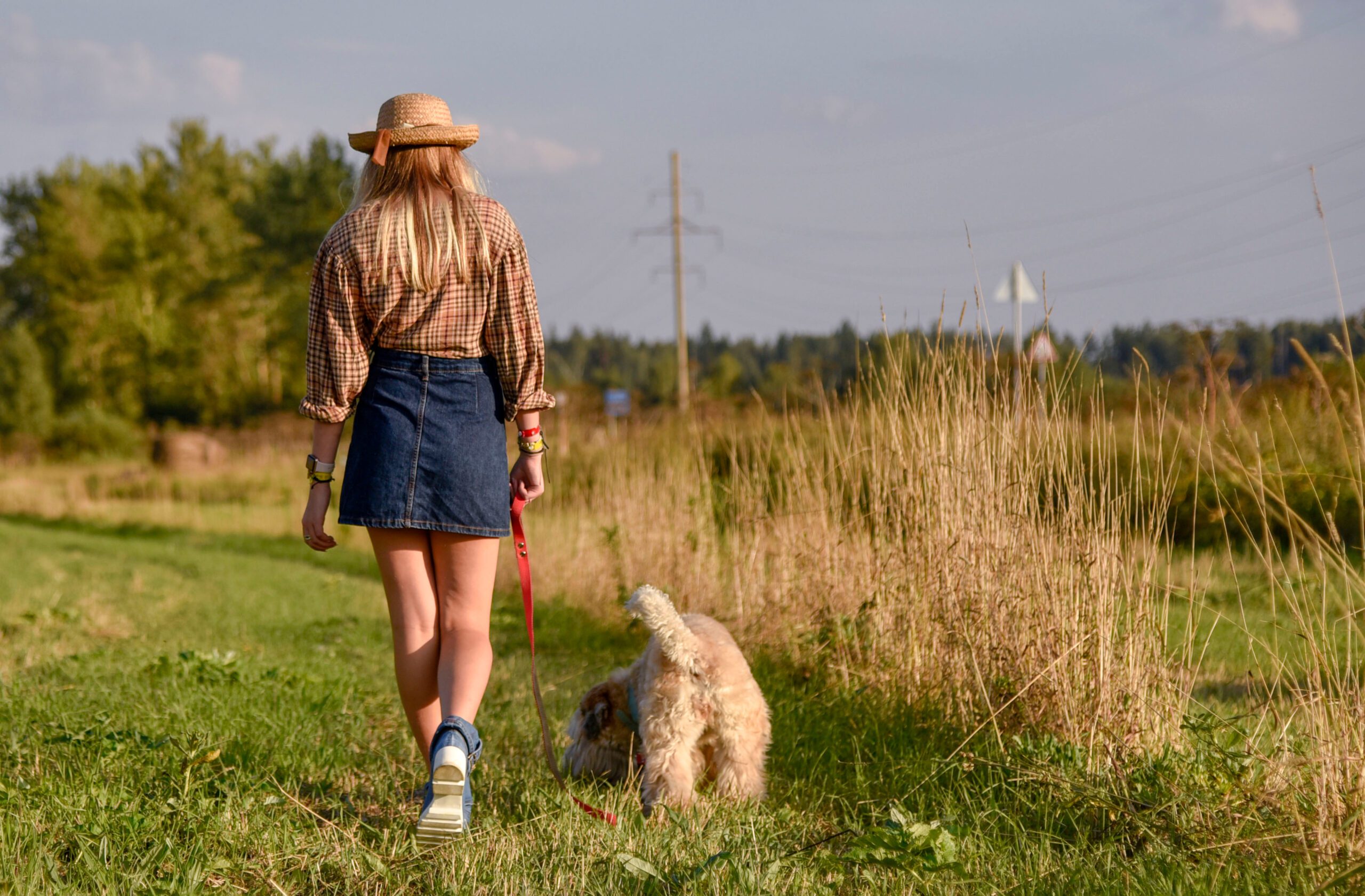 A girl walking her emotional support dog in North Dakota.