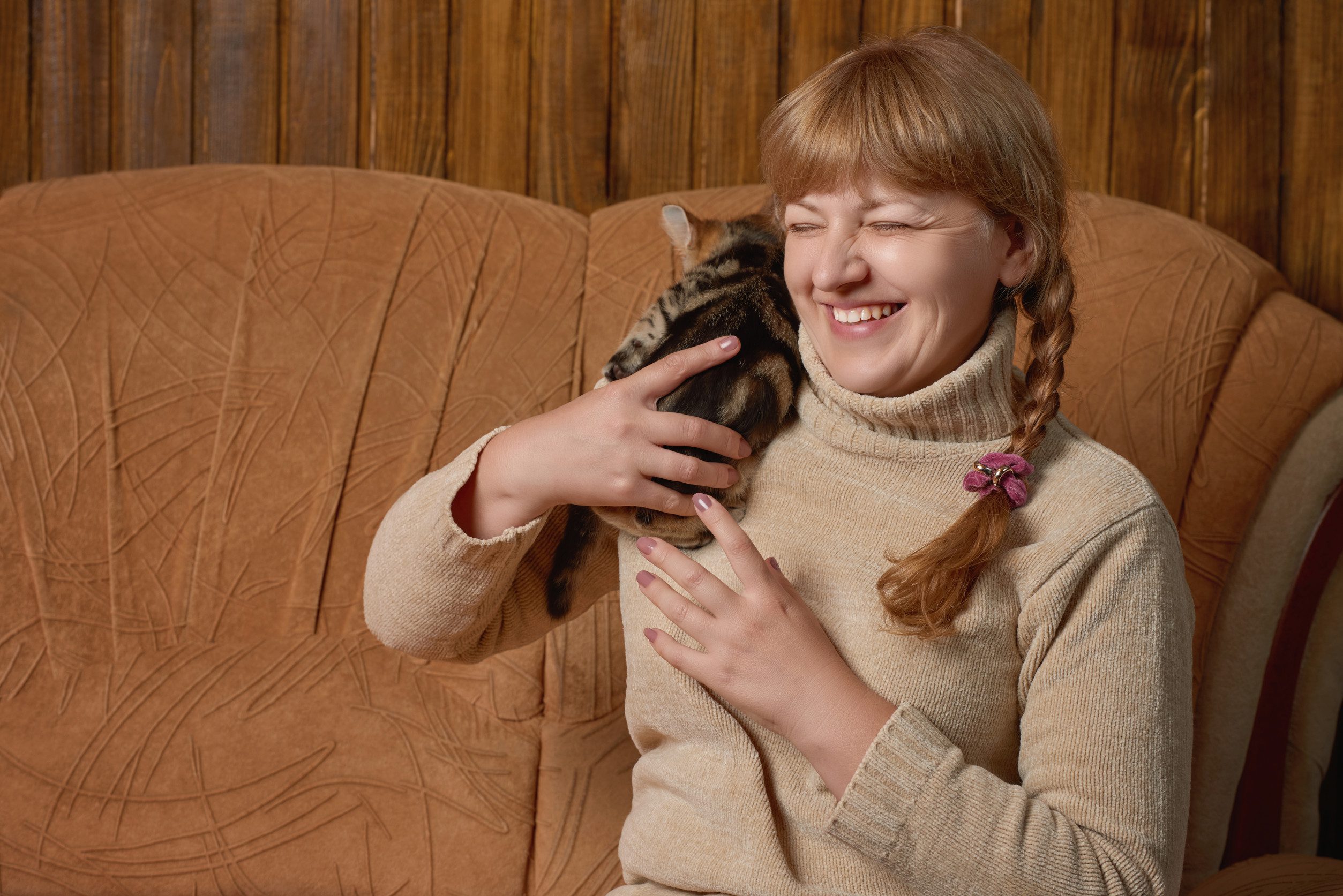 A girl playing with her emotional support animal in Albuquerque, NM.