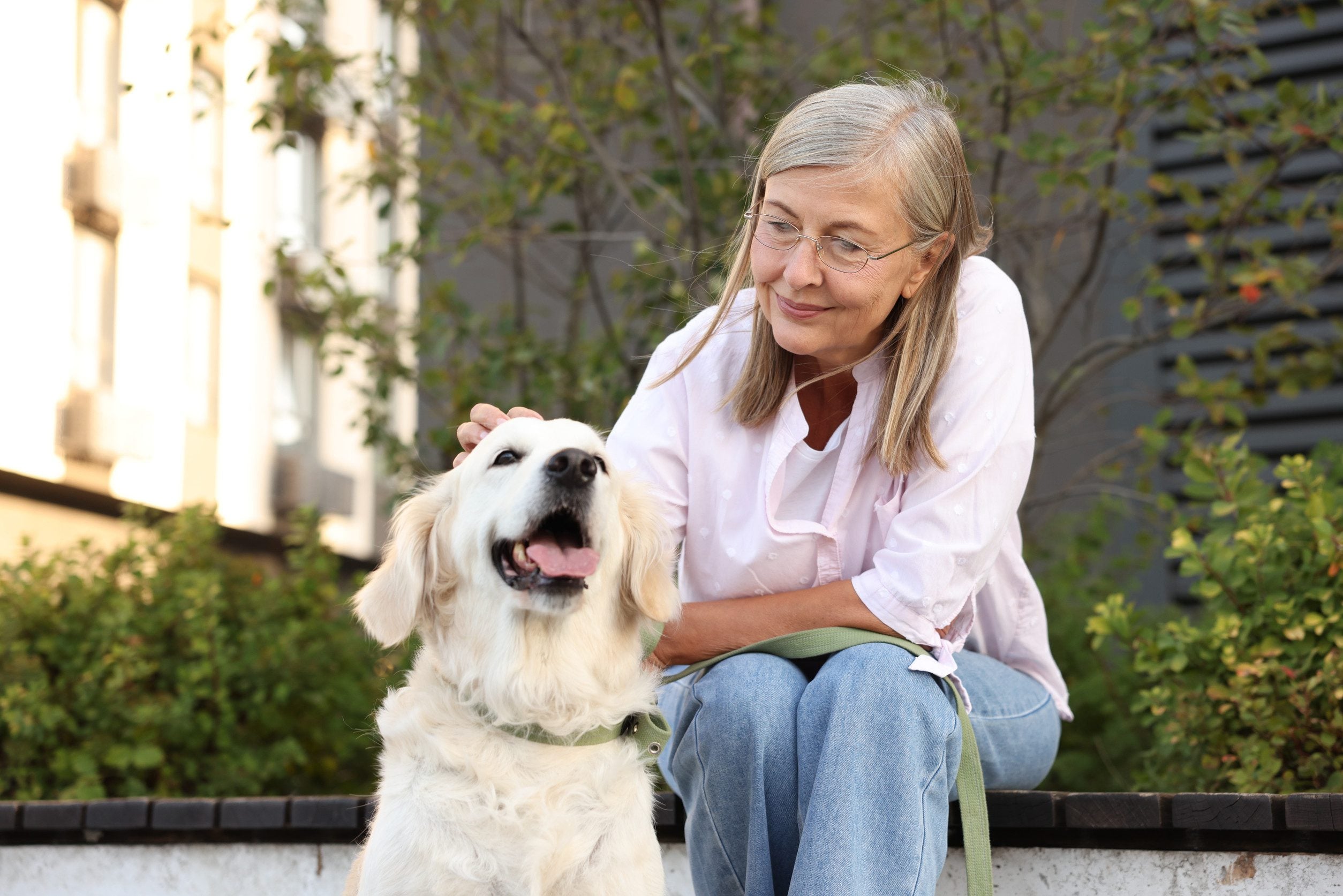 An older woman spending time with her emotional support animal in Burlington, VT.