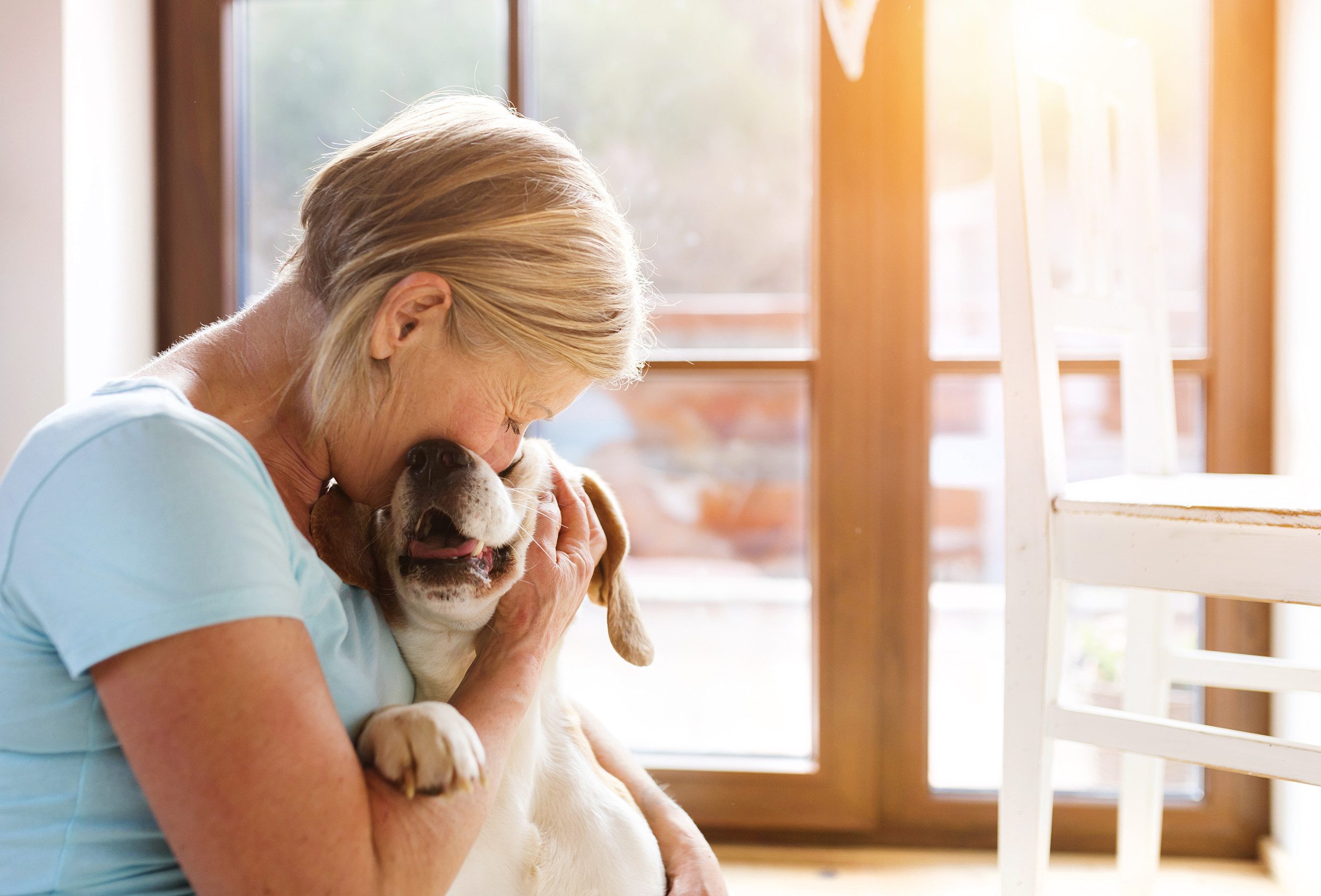 A woman hugging her emotional support animal in Cheyenne, WY.
